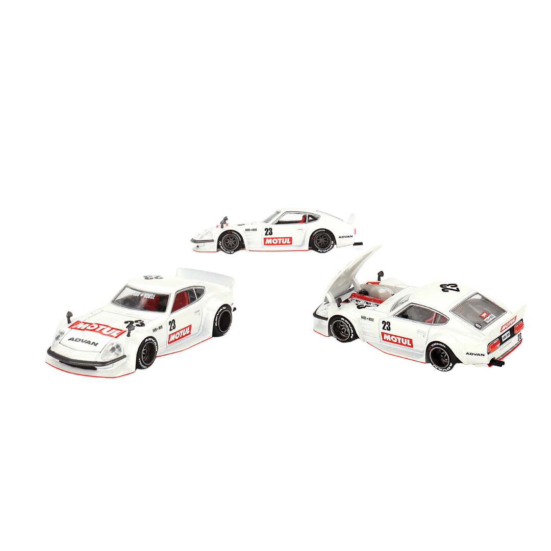 White 1:64 model car with Motul writen on the door