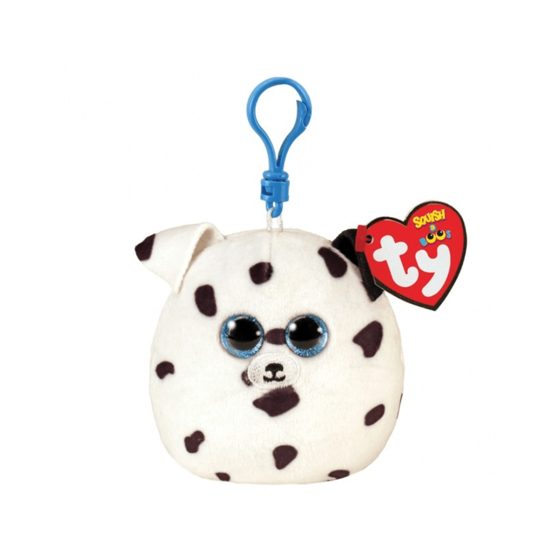 white dog with black spots and blue sparkly eyes on a clip